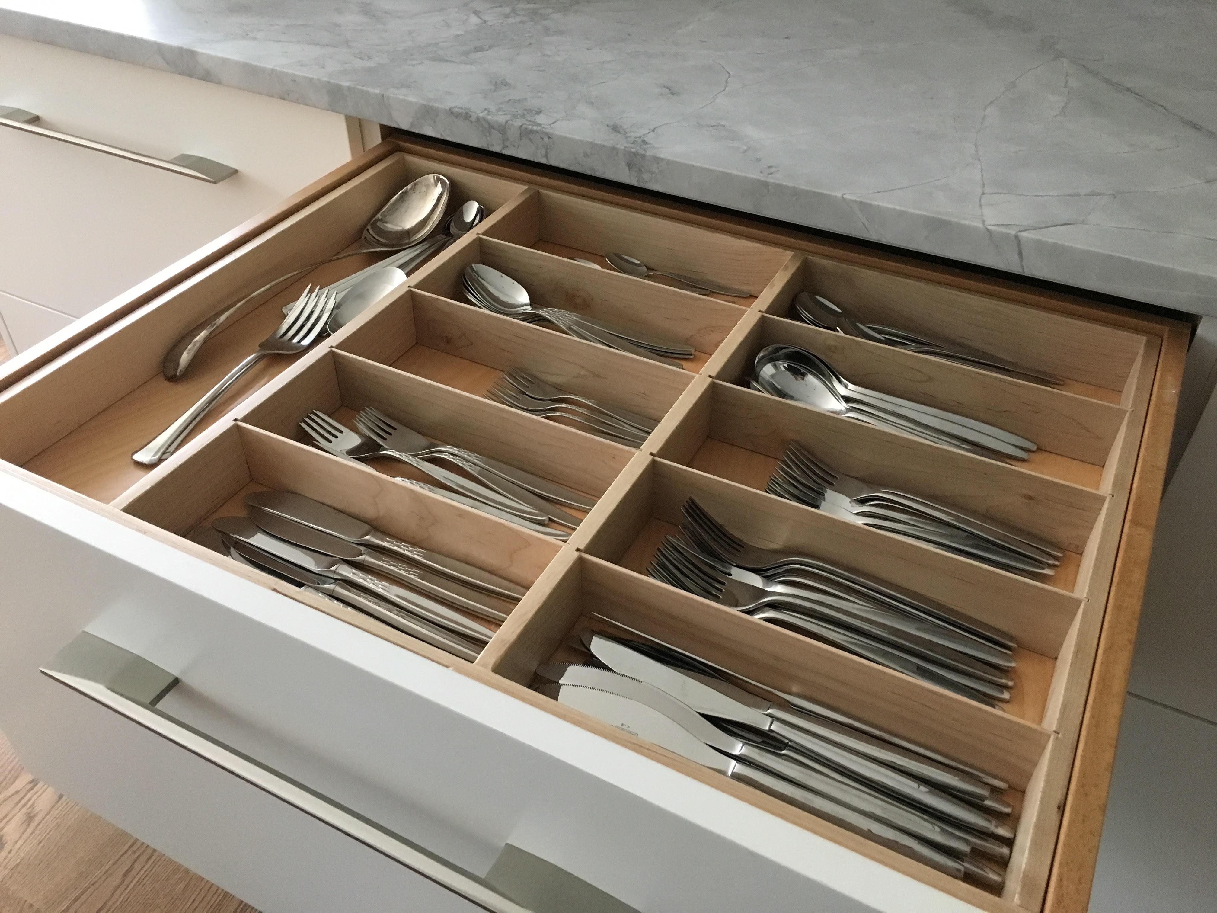 custom kitchen gadget drawer with targeted dividers